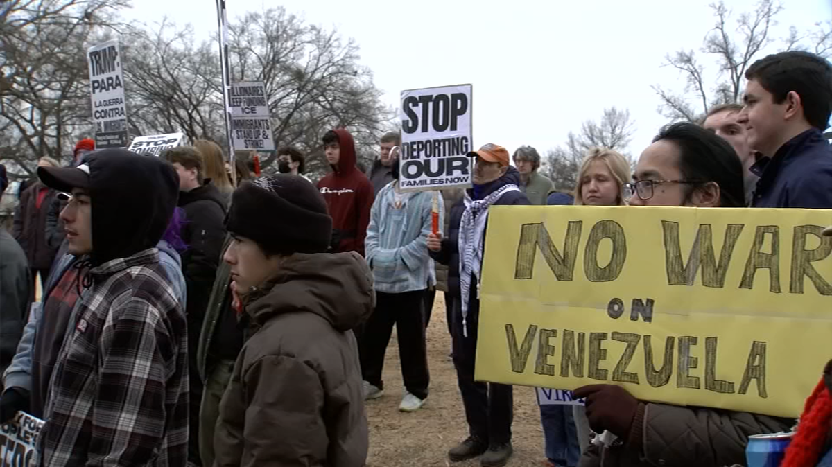 Around 100 protesters gathered at Moore Square in Raleigh to oppose U.S. airstrikes on Venezuela and the capture of President Nicolás Maduro.