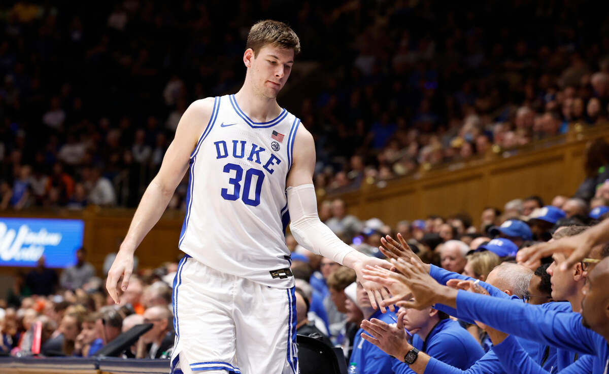 Duke’s Kyle Filipowski (30) is greeted as he comes back to the bench during the second half of Duke’s 90-60 victory over Bucknell at Cameron Indoor Stadium in Durham, N.C., Friday, Nov. 17, 2023.