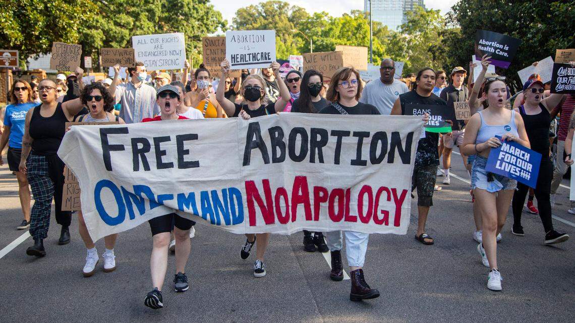Hundreds of demonstrators rally and march in downtown Raleigh Friday, June, 24, 2022 in opposition to the U.S. Supreme Court’s decision to overturn its landmark Roe v. Wade ruling.