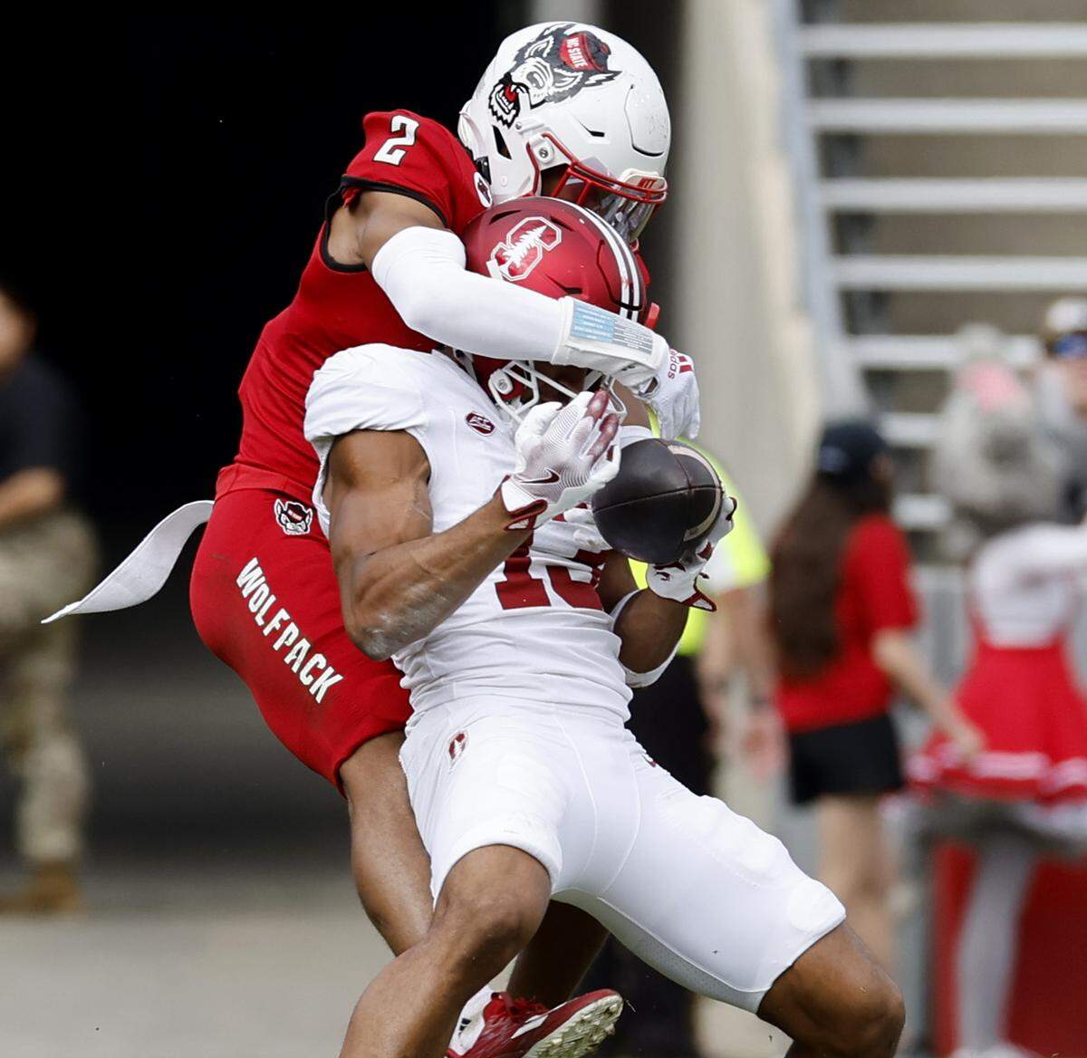 N.C. State cornerback Brandon Cisse (2) breaks a pass intended for Stanford wide receiver Elic Ayomanor (13) during the first half of N.C. State’s game against Stanford at Carter-Finley Stadium in Raleigh, N.C., Saturday, Nov. 2, 2024.