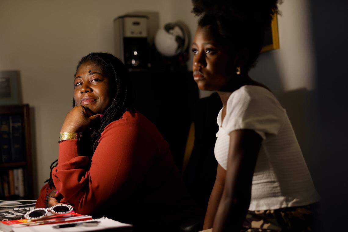 Yolanda Taylor and her 12-year-old daughter Chloe Taylor sit inside their home office Wednesday evening in Wake Forest March 8, 2023. “We live in a diverse society and we can’t hide that from our children. Our children need to be equipped to live in this world,” said Taylor.