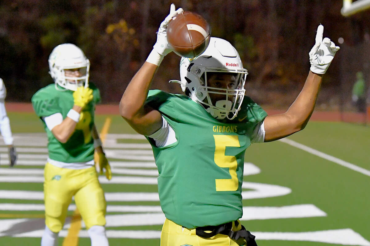 Cardinal Gibbons running back Kendall Scotton (5) celebrates his touchdown against Hillside during the first half. The Cardinal Gibbons Crusaders and the Durham Hillside Hornets met in the third round of the NCHSAA 4A playoffs in Raleigh, N.C. on November 29, 2024.