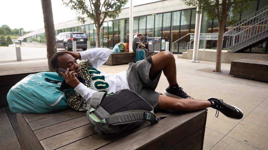 Louis Grant sits outside Union Station in Raleigh on Tuesday, July 11, 2023 after his train was canceled. Amtrak was forced to cancel northbound traffic after a train derailed in Washington, D.C., blocking the tracks.