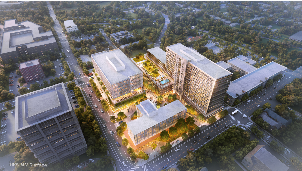 A rendering of the proposed redevelopment of Durham’s former police headquarters if the historic building, bottom left, is saved and converted into a hotel.