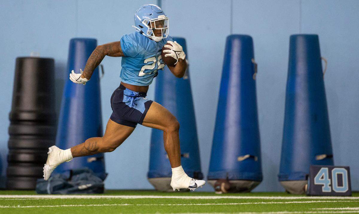 North Carolina running back Omarion Hampton (28) breaks open on a long run during the Tar Heels’ first practice of the season on Wednesday, August 2, 2023 in Chapel Hill, N.C.
