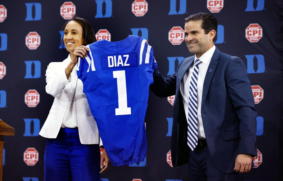 Duke athletics director Nina King introduces Manny Diaz as Duke’s new head football coach during a press conference at Pascal Field House in Durham, N.C., Saturday, Dec. 9, 2023.