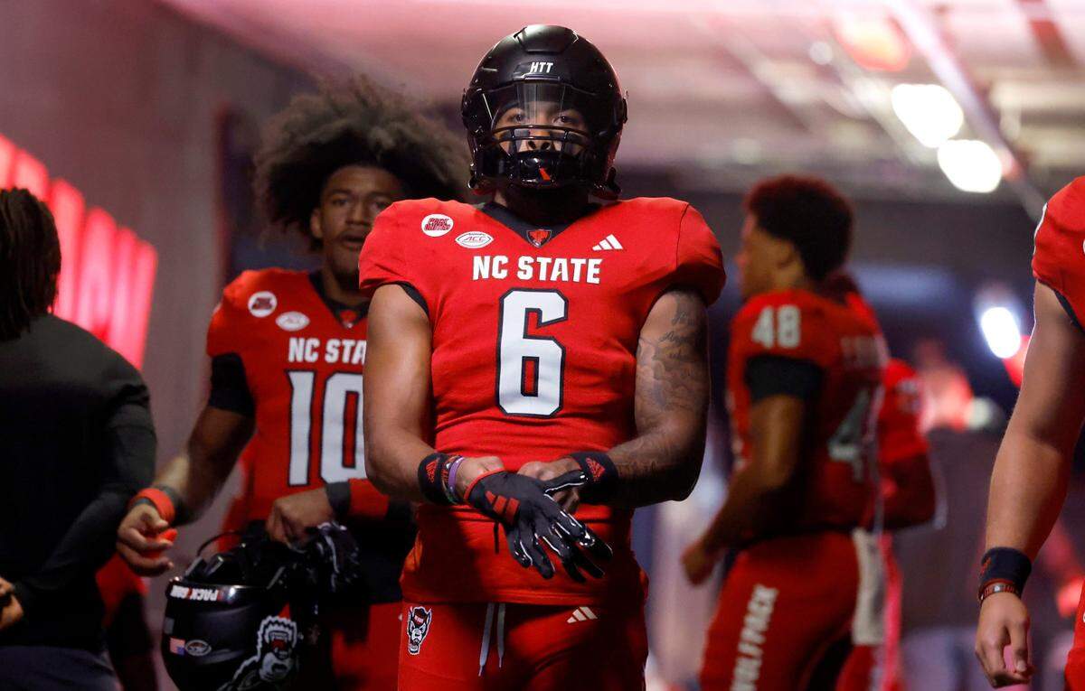 N.C. State’s Trent Pennix (6) heads out to the field to warm up before the Wolfpack’s game against Miami at Carter-Finley Stadium in Raleigh, N.C., Saturday, Nov. 4, 2023.