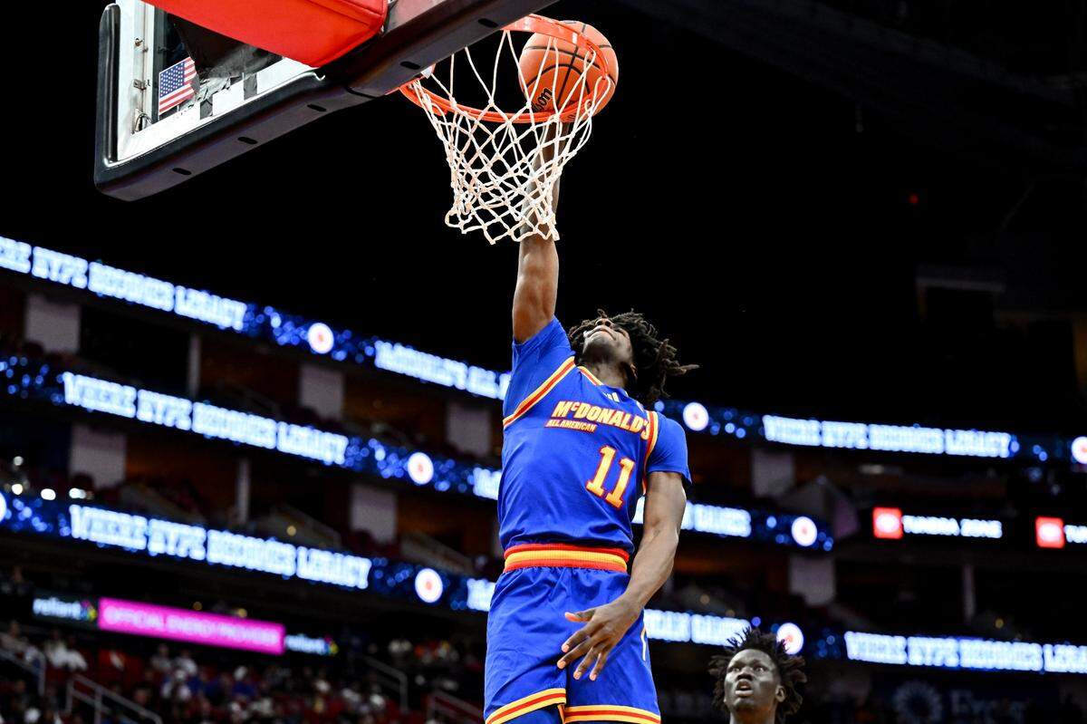 Apr 2, 2024; Houston, TX, USA; McDonald’s All American East forward Ian Jackson&nbsp;(11) shoots a layup during the first half against the McDonald’s All American West at Toyota Center. 