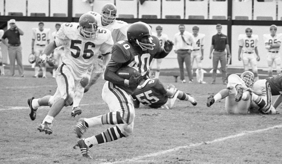 Marshall’s Jerry Stainback (56) chases East Carolina’s Les Strayhorn as he heads upfield during East Carolina’s game against Marshall in Greenville, N.C., on Nov. 14, 1970. Stainback, a day shy of his 24th birthday, married with a 1-year-old son, died in the plane crash that evening.