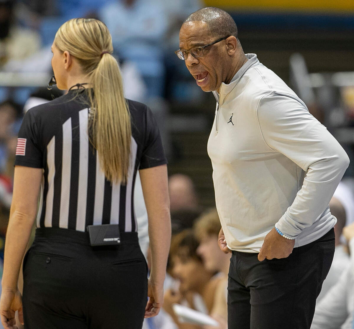 North Carolina coach Hubert Davis questions official Jenna Reneua about a foul on his team during the first half against The Citadel on Tuesday, December 13, 2022 at the Smith Center in Chapel Hill, N.C.