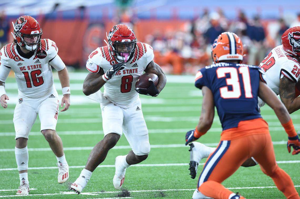 North Carolina State Wolfpack running back Ricky Person Jr. (8) gains yards during a game against Syracuse in the second half on Saturday, Nov. 28, 2020, at the Carrier Dome in Syracuse, N.Y.