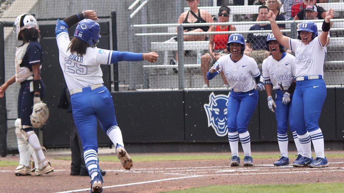 Duke first baseman Jada Baker (25) runs toward her teammates after hitting a home run during the Blue Devils’ 12-0 NCAA Tournament Regional win against Howard University on Friday, May 16, 21025, at Duke Softball Stadium in Durham, N.C.