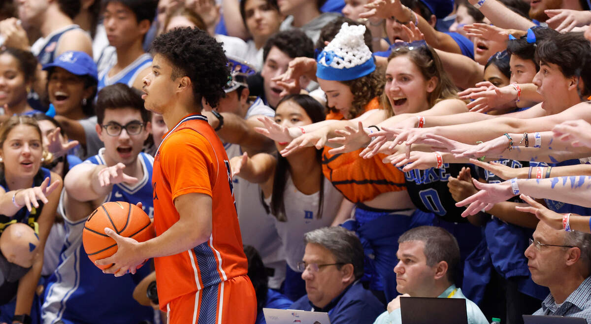 The Cameron Crazies heckle Bucknell’s Josh Bascoe (13) as he waits to inbound the ball during the first half of Duke’s game against Bucknell at Cameron Indoor Stadium in Durham, N.C., Friday, Nov. 17, 2023.