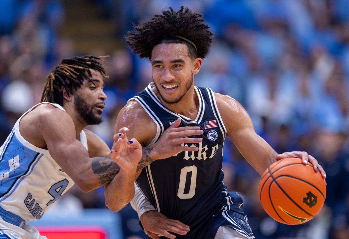 North Carolina’s R.J. Davis (4) defends Duke’s Jared McCain (0) in the first half on Saturday, February, 3, 2024 at the Dean E. Smith Center in Chapel Hill, NC.