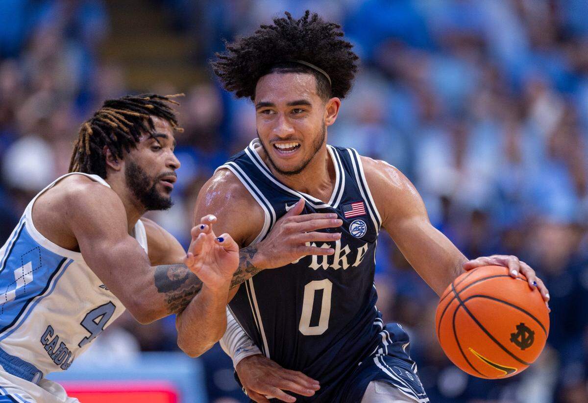 North Carolina’s R.J. Davis (4) defends Duke’s Jared McCain (0) in the first half on Saturday, February, 3, 2024 at the Dean E. Smith Center in Chapel Hill, NC.