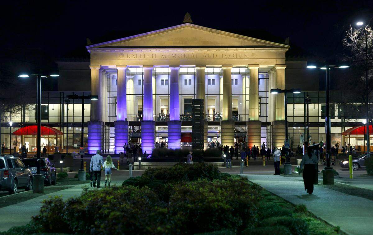 Buildings in downtown Raleigh, including the Duke Energy Center for the Performing Arts, displayed blue and yellow lights to show support of Ukraine, Wednesday evening, March 2, 2022.