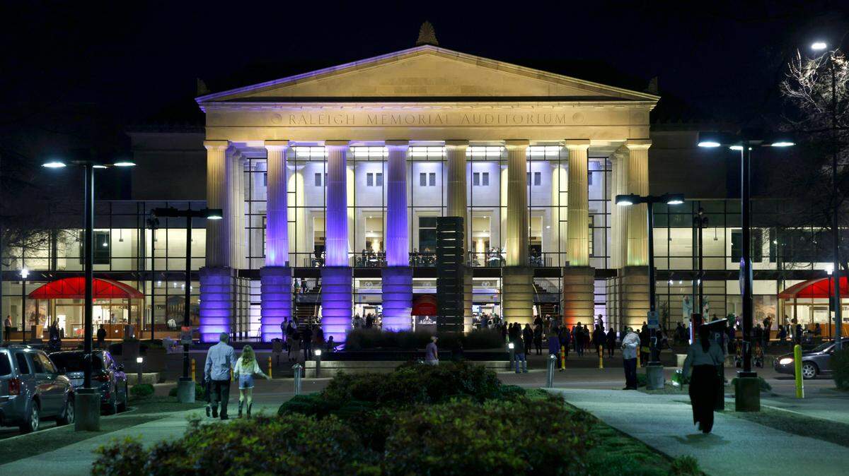 Buildings in downtown Raleigh, including the Duke Energy Center for the Performing Arts, displayed blue and yellow lights to show support of Ukraine, Wednesday evening, March 2, 2022.
