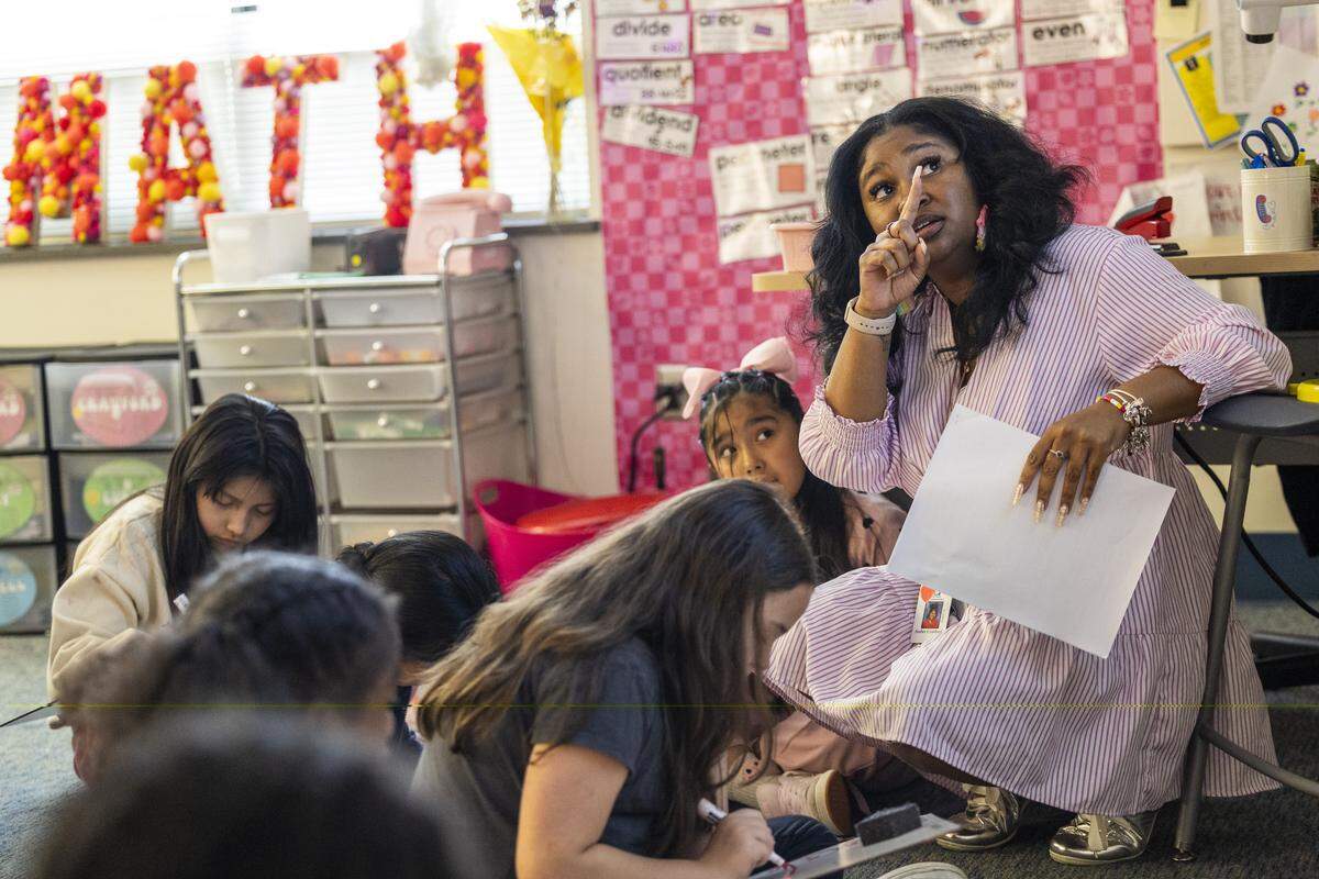 Third-grade teacher Amber Crawford teaches a math lesson Thursday, April 30, 2026, at Aversboro Elementary School in Garner.