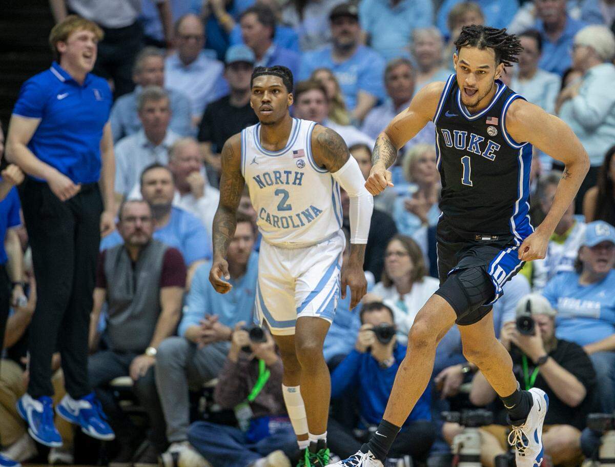 Duke’s Dereck Lively II (1) reacts after a dunk to tie the score 49-49 against North Carolina in the second half on Saturday, March 4, 2023 at the Smith Center in Chapel Hill, N.C.