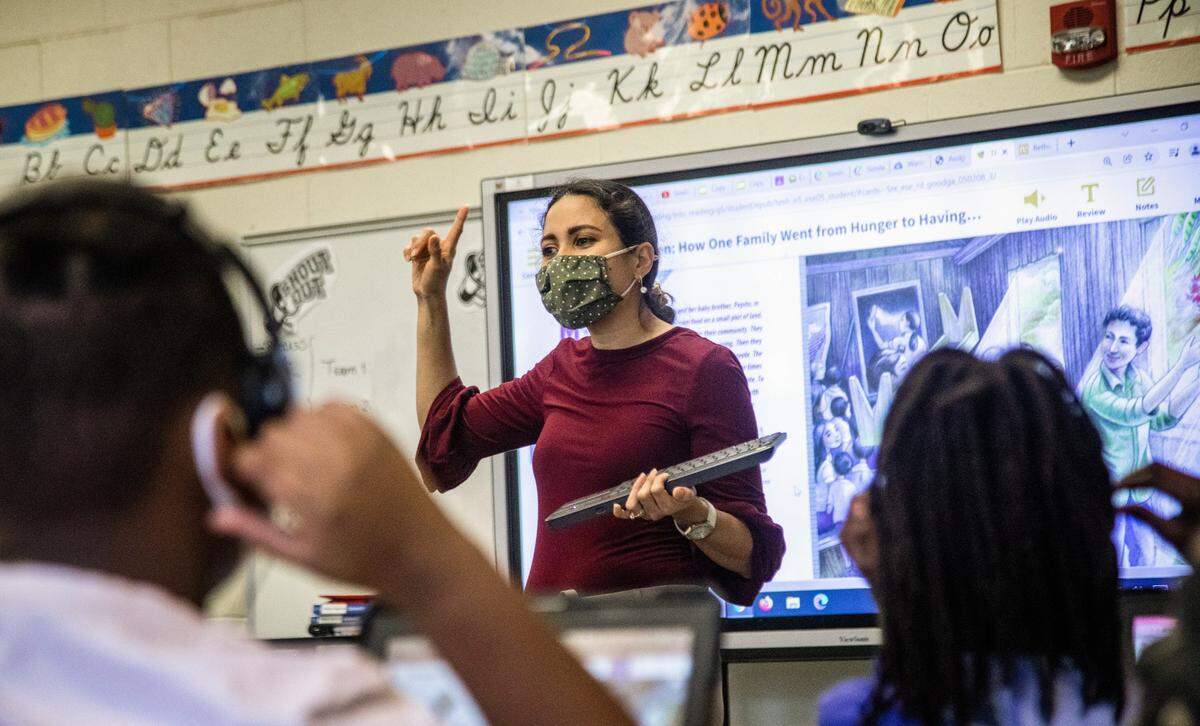 Dania Munoz teaches a fifth-grade class at Mariam Boyd Elementary in Warrenton Tuesday, Dec. 7, 2021. Rural North Carolina school systems like Warren County Public Schools have been waiting since the start of the Leandro court case in 1994 to get the funding needed to level the playing field with urban districts.