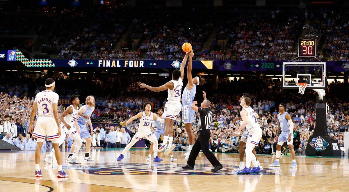 North Carolina’s Armando Bacot (5) and Kansas’ David McCormack (33) tip off at the start of UNC’s game against Kansas in the NCAA Men’s National Championship at the Caesars Superdome in New Orleans, La., Monday, April 4, 2022.