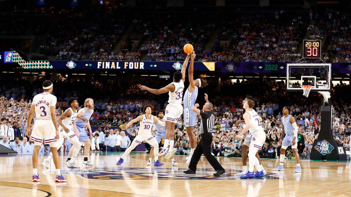 North Carolina’s Armando Bacot (5) and Kansas’ David McCormack (33) tip off at the start of UNC’s game against Kansas in the NCAA Men’s National Championship at the Caesars Superdome in New Orleans, La., Monday, April 4, 2022.