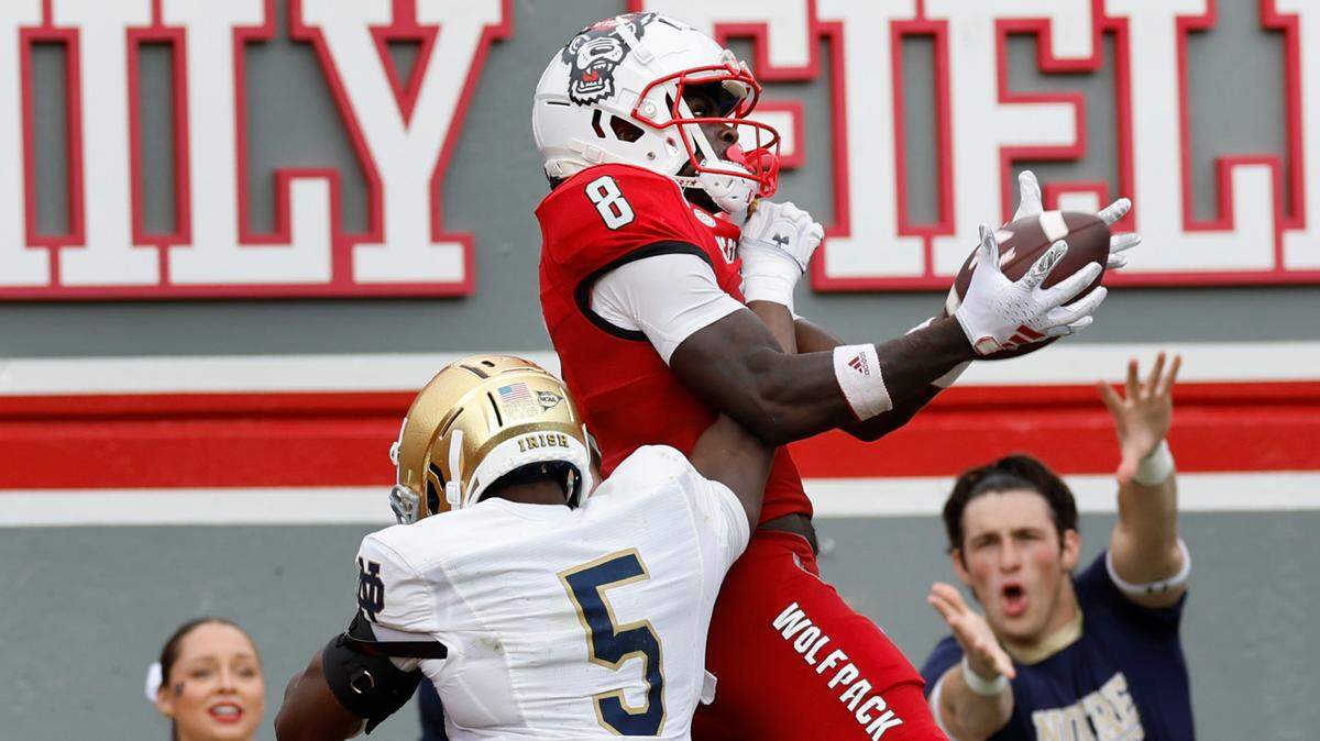N.C. State wide receiver Julian Gray (8) can’t pull in the pass as Notre Dame cornerback Cam Hart (5) defends during the second half of Notre Dame’s 45-24 victory over N.C. State at Carter-Finley Stadium in Raleigh, N.C., Saturday, Sept. 9, 2023.