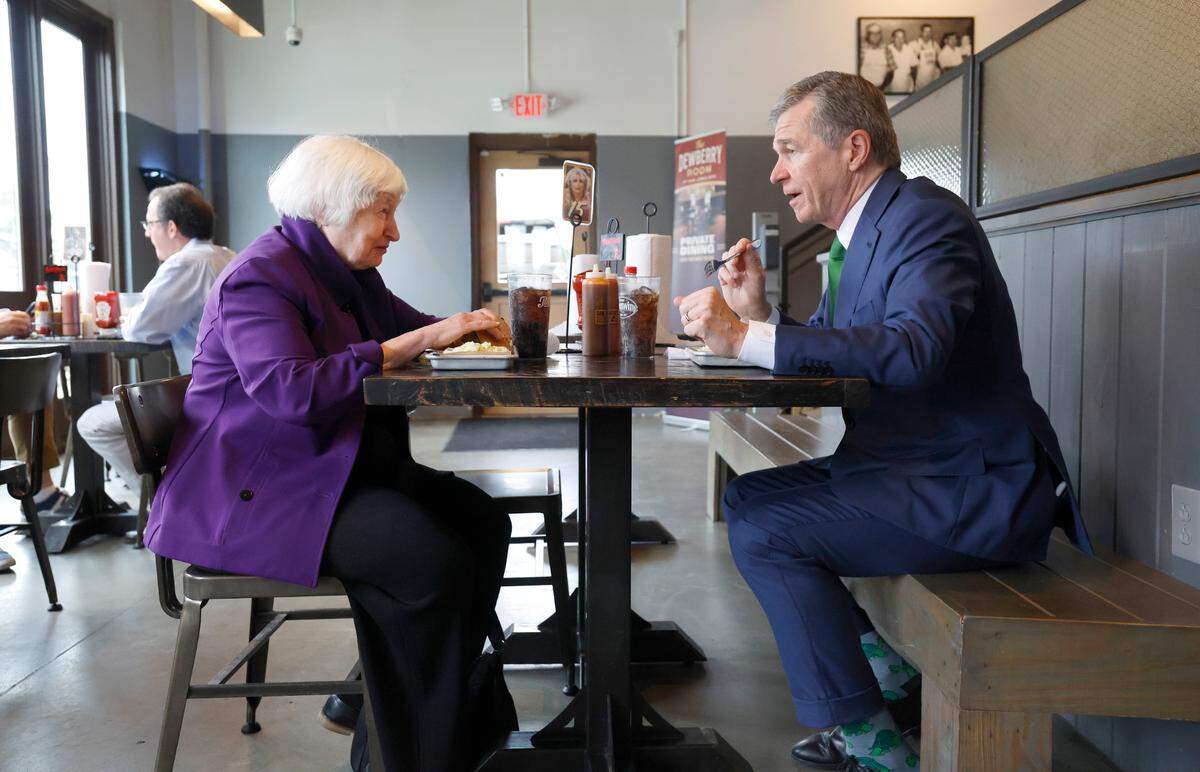 U.S. Secretary of the Treasury Janet Yellen and N.C. Gov. Roy Cooper enjoy lunch at Sam Jones BBQ in Raleigh Thursday, Sept. 5, 2024.