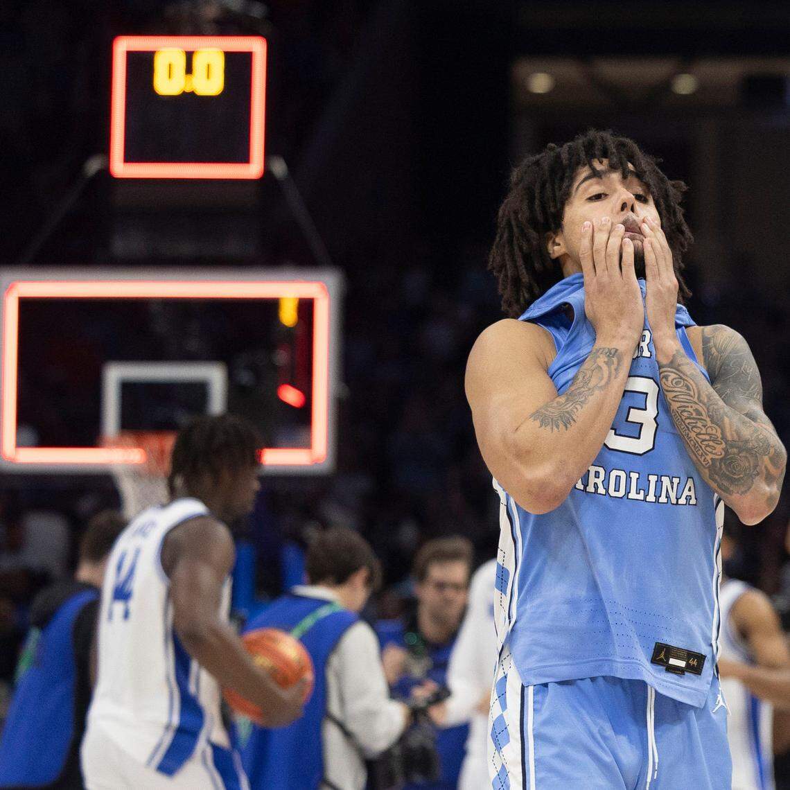 North Carolina guard Elliot Cadeau (3) reacts as he leaves the court after falling 74-71 to Duke on Friday, March 14, 2025 during the semifinals of the ACC Tournament at Spectrum Center in Charlotte, N.C.