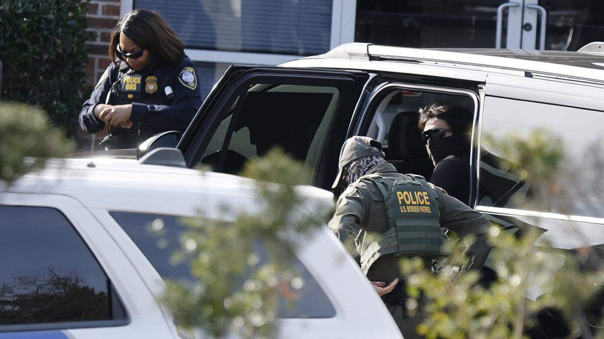 Agents gather in Cary, N.C., Tuesday, Nov. 18, 2025.
