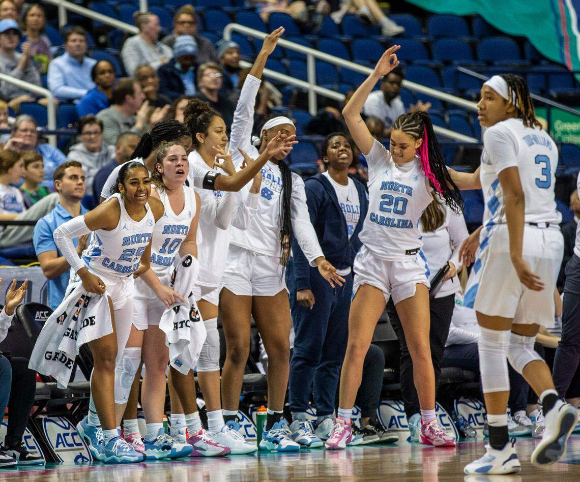 Carolina’s bench celebrates Kayla McPherson’s three-point shot during the second round game with Clemson at the 2023 ACC Women’s Basketball Tournament at the Greensboro Coliseum Complex in Greensboro, N.C., on Thursday, March 2, 2023.