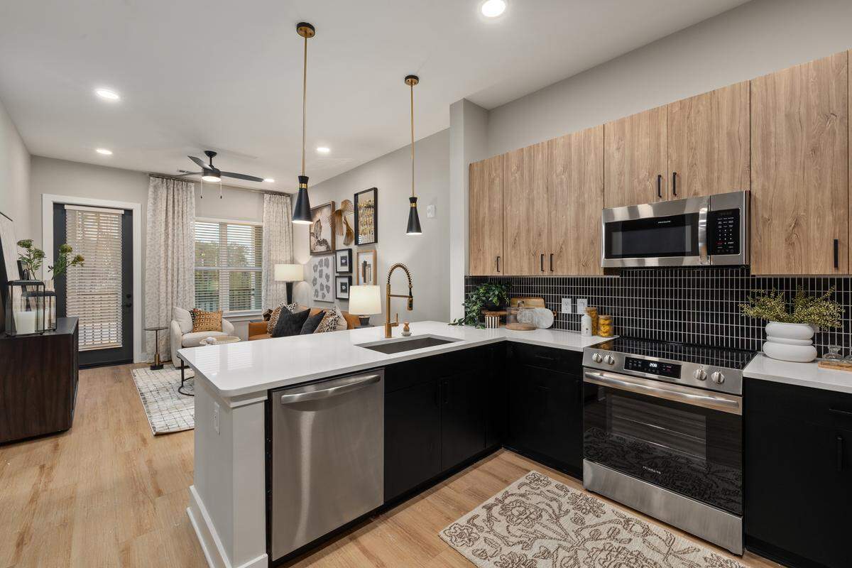 A model kitchen inside EMORIE, a 302-unit rental building in west Cary.