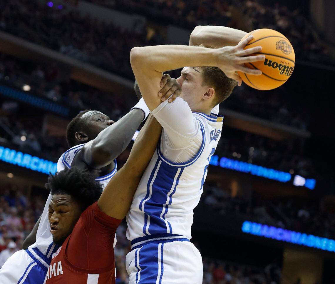 Duke’s Cooper Flagg (2) pulls in a rebound from Alabama’s Mouhamed Dioubate (10) during the first half of Duke’s game against Alabama in their Elite 8 game in the 2025 NCAA Men’s Basketball Championship at the Prudential Center in Newark, N.J., Saturday, March 29, 2025.