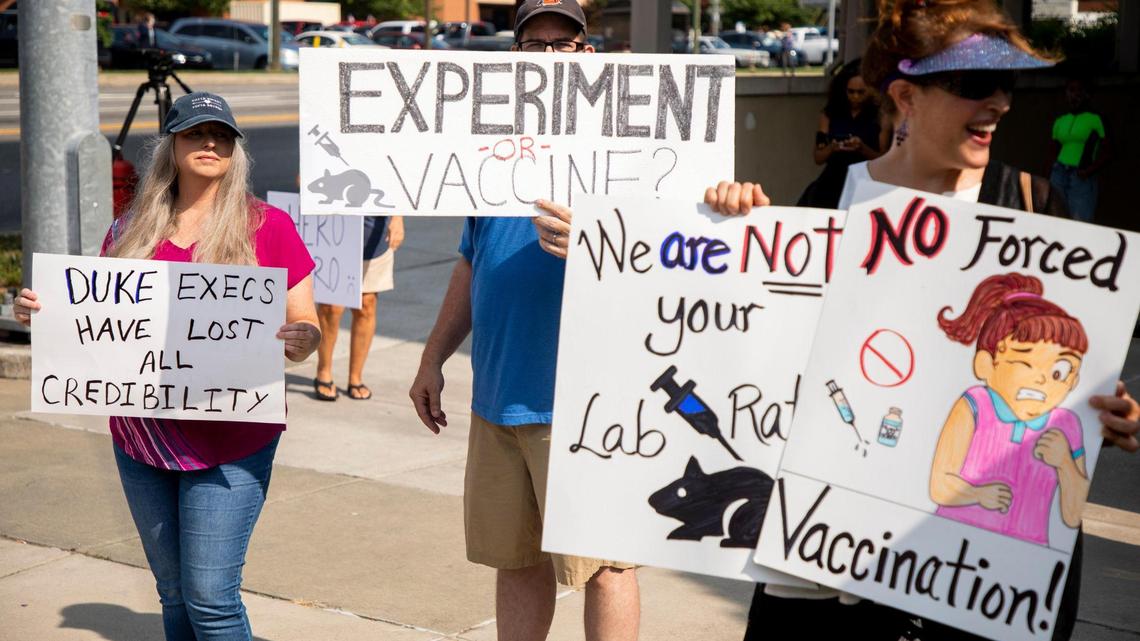 Protesters gather outside Duke University Hospital in Durham on July 30 to oppose the hospital system’s COVID-19 vaccine mandate for employees. In the end, fewer than 20 workers lost their jobs over the requirement.