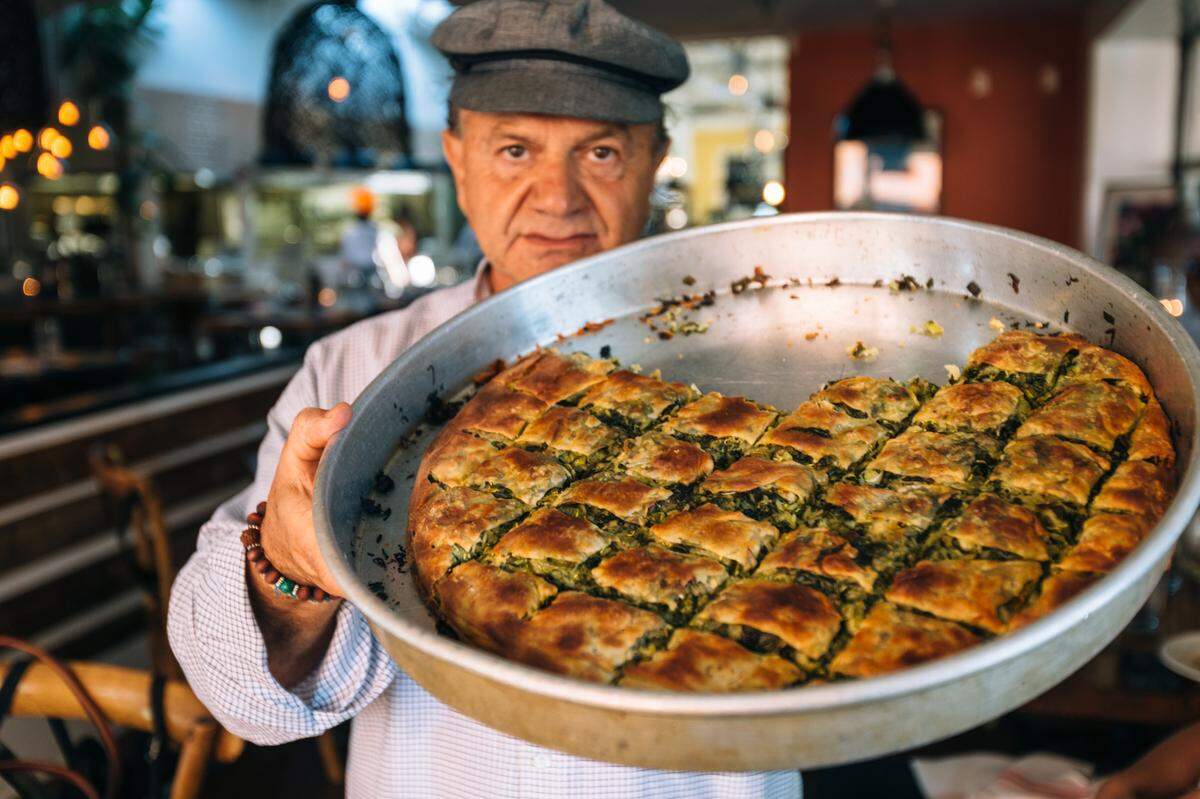 Triangle restaurateur Giorgios Bakatsias relocated Kipos, his popular Greek tavern on Franklin Street in Chapel Hill, to Eastgate Shopping Center.