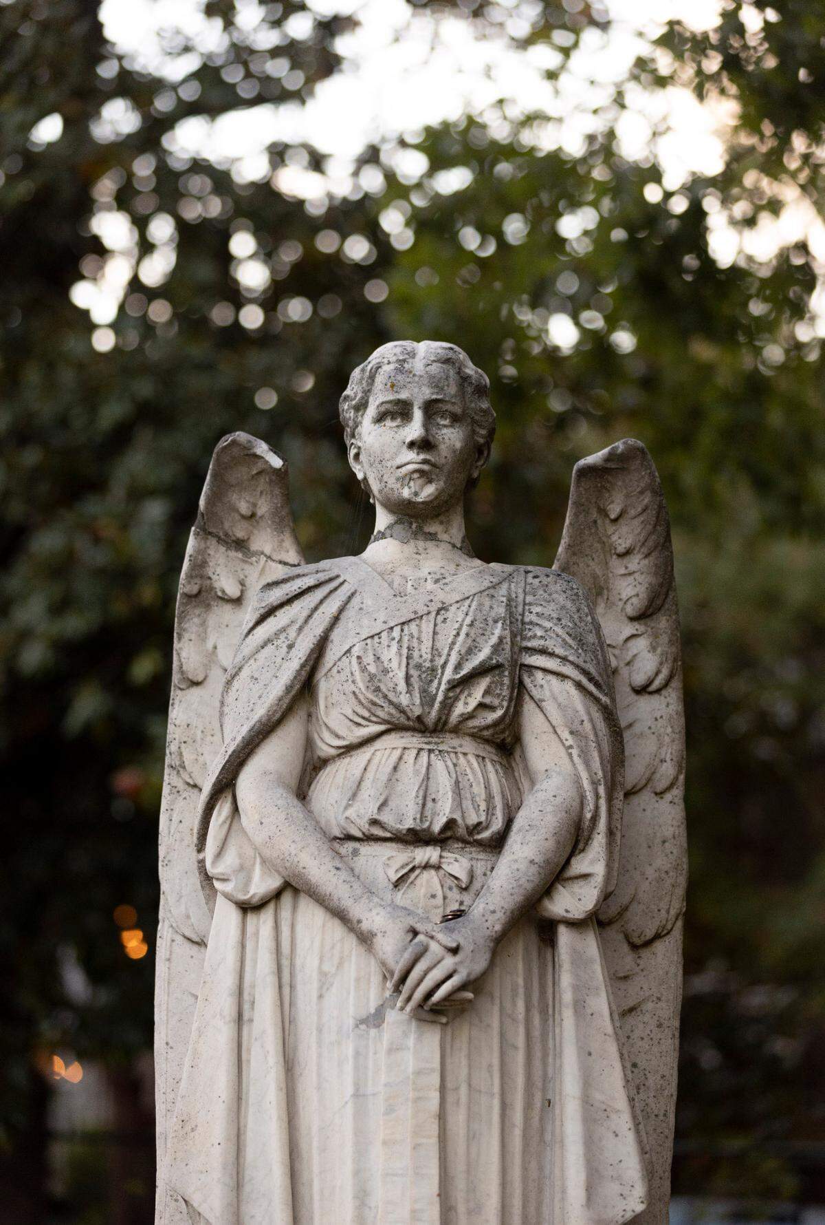 The Ratcliffe Angel in Raleigh’s Historic Oakwood Cemetery stands over the grave of Etta Rebecca White Ratcliffe. Photographed October 7, 2022.