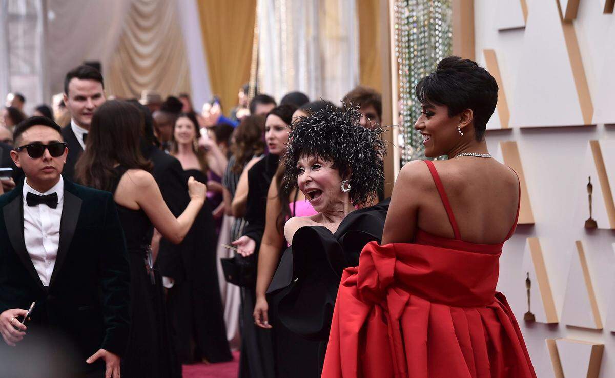 Rita Moreno, left, and Ariana DeBose arrive at the Oscars on Sunday, March 27, 2022, at the Dolby Theatre in Los Angeles. (Photo by Jordan Strauss/Invision/AP)