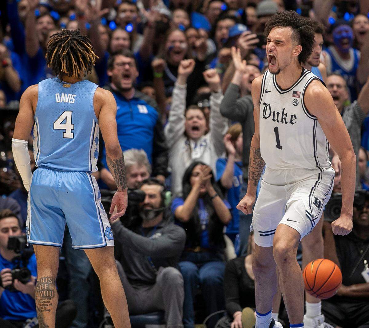 Duke’s Dereck Lively II (1) reacts after a dunk to give the Blue Devils a 59-57 lead with 1:32 to play and helping to secure their 63-57 win over North Carolina on Saturday, February 4, 2023 at Cameron Indoor Stadium in Durham, N.C.