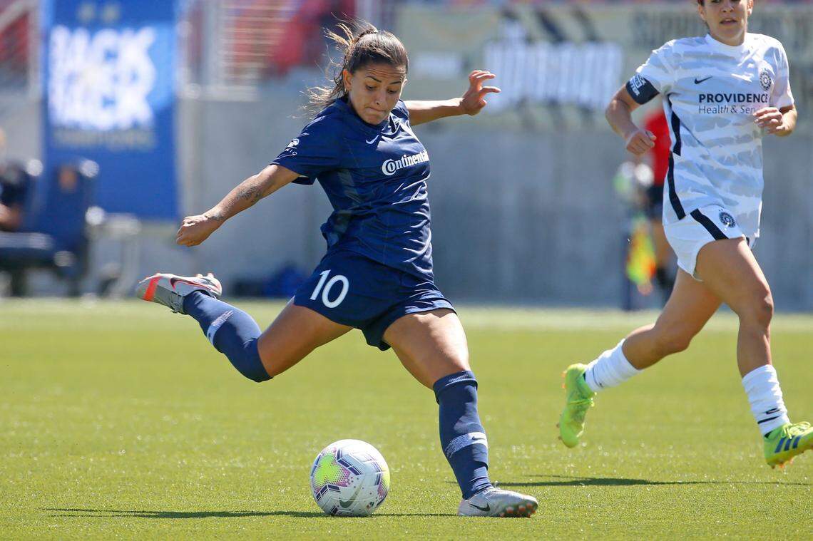 North Carolina Courage midfielder Debinha (10) takes a shot during the first half of an NWSL Challenge Cup soccer match against the Portland Thorns FC at Zions Bank Stadium Saturday, June 27, 2020, in Herriman, Utah.