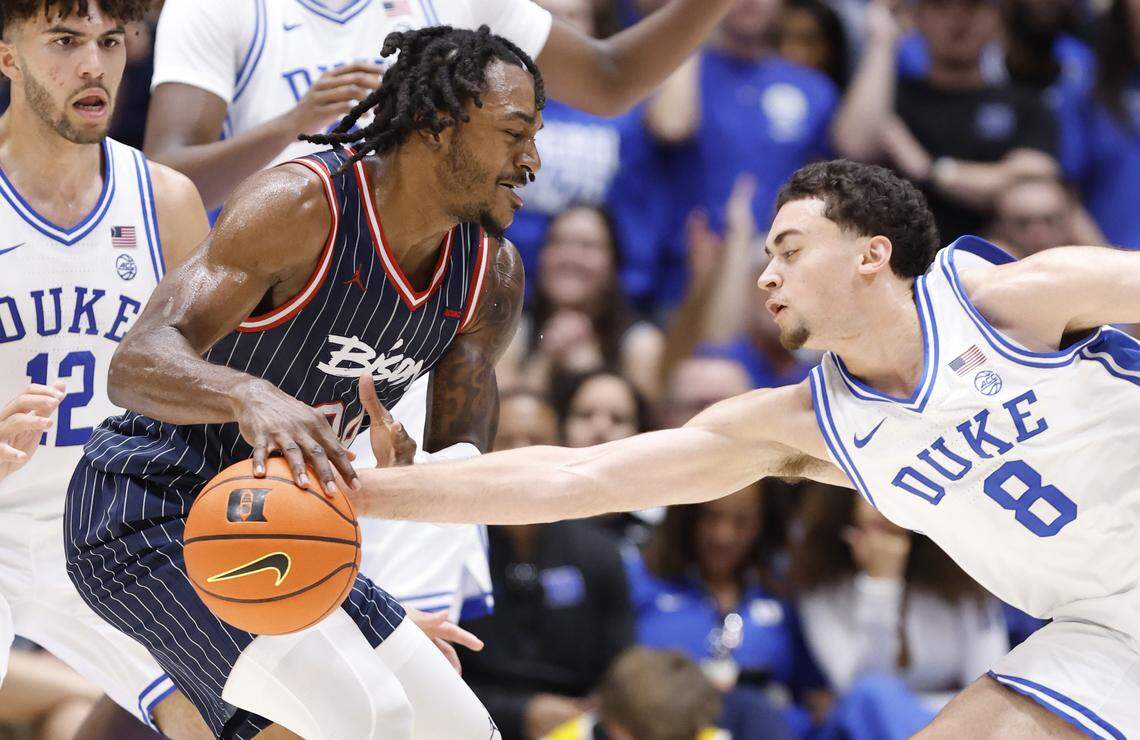 Duke’s Darren Harris (8) steals the ball from Howard's Bryce Harris (34) during the first half of Duke’s game against Howard at Cameron Indoor Stadium in Durham, N.C., Sunday, Nov. 23, 2025.