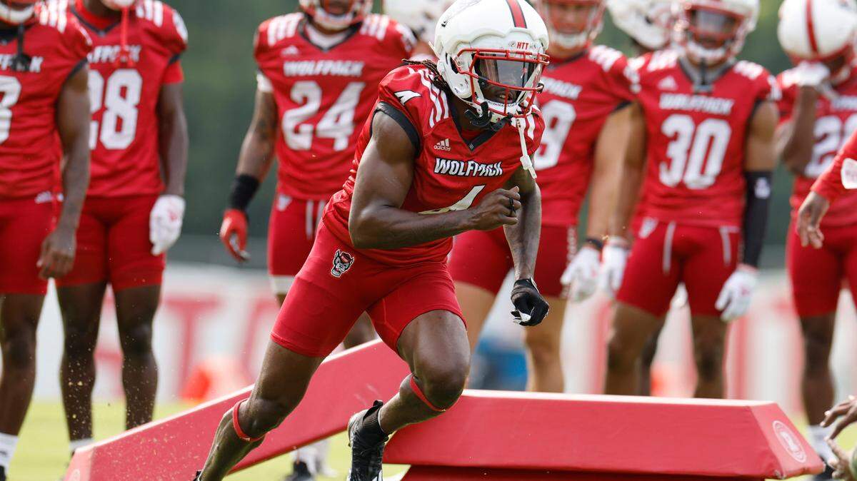 N.C. State cornerback Cecil Powell (4) runs a drill during the Wolfpack’s first fall practice in Raleigh, N.C., Wednesday, August 2, 2023.