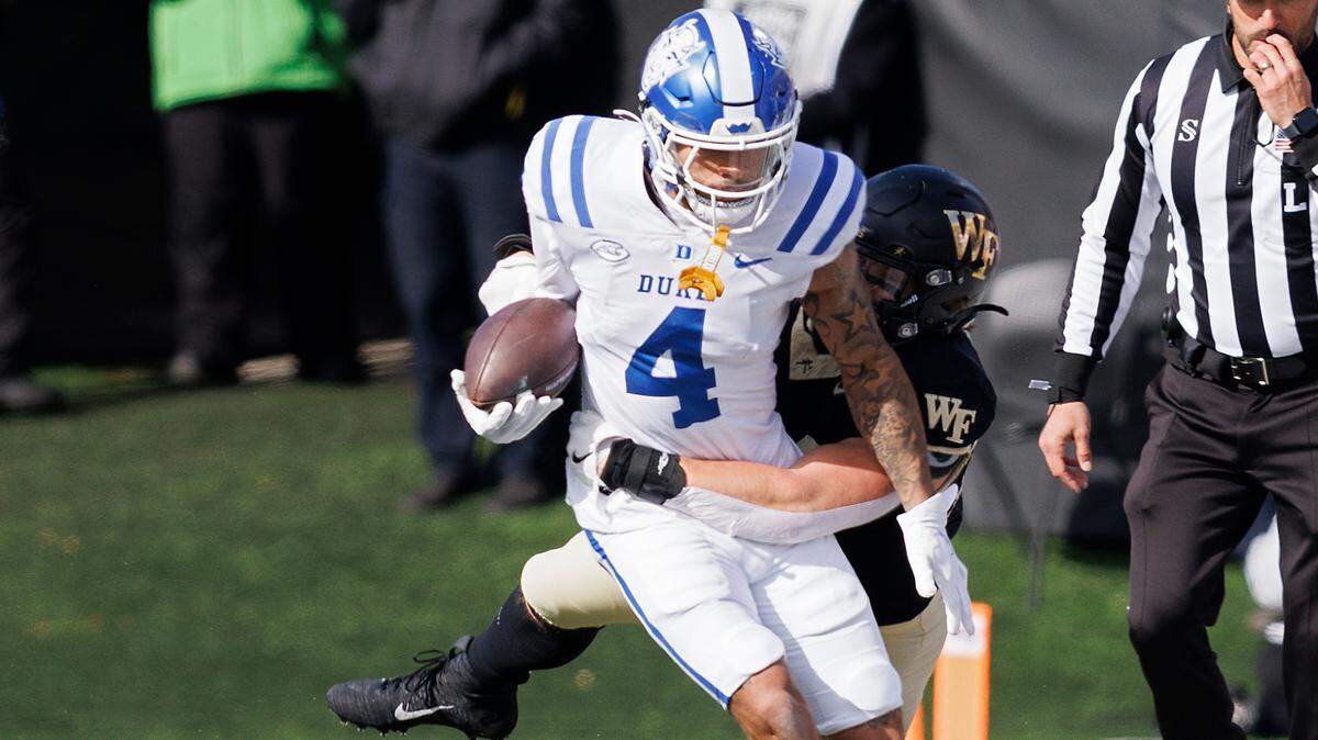 Duke’s Eli Pancol is tackled by Wake Forest’s Dylan Hazen during the first half of the Blue Devils’ game at Allegacy Stadium on Saturday, Nov. 30, 2024, in Winston-Salem, N.C.