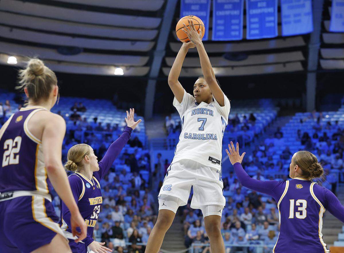 North Carolina’s Nyla Brooks shoots over Western Illinois’ Kaylen Reed and Addi Brownfield during the first half of the Tar Heels’ 82-51 first-round NCAA Tournament win on Friday, March 20, 2026, at Carmichael Arena in Chapel Hill, N.C.