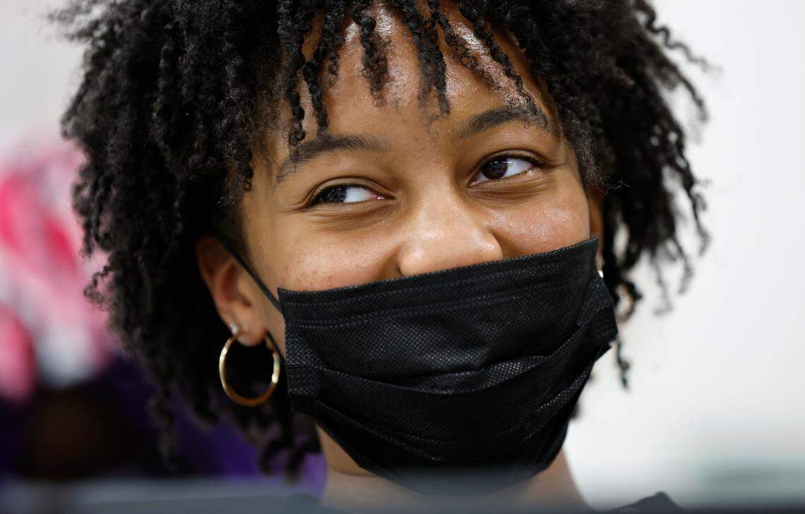 Junior Alysia Davis laughs during her IB History class at Hillside High School in Durham, N.C., Thursday, April 28, 2022.