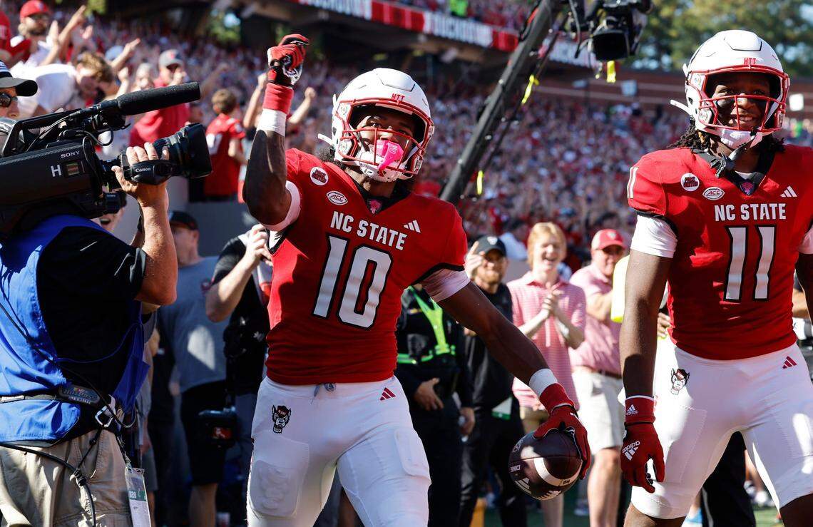 N.C. State wide receiver KC Concepcion (10) celebrates after scoring on a nine-yard touchdown reception in the first half of N.C. State’s game against Clemson at Carter-Finley Stadium in Raleigh, N.C., Saturday, Oct. 28, 2023.