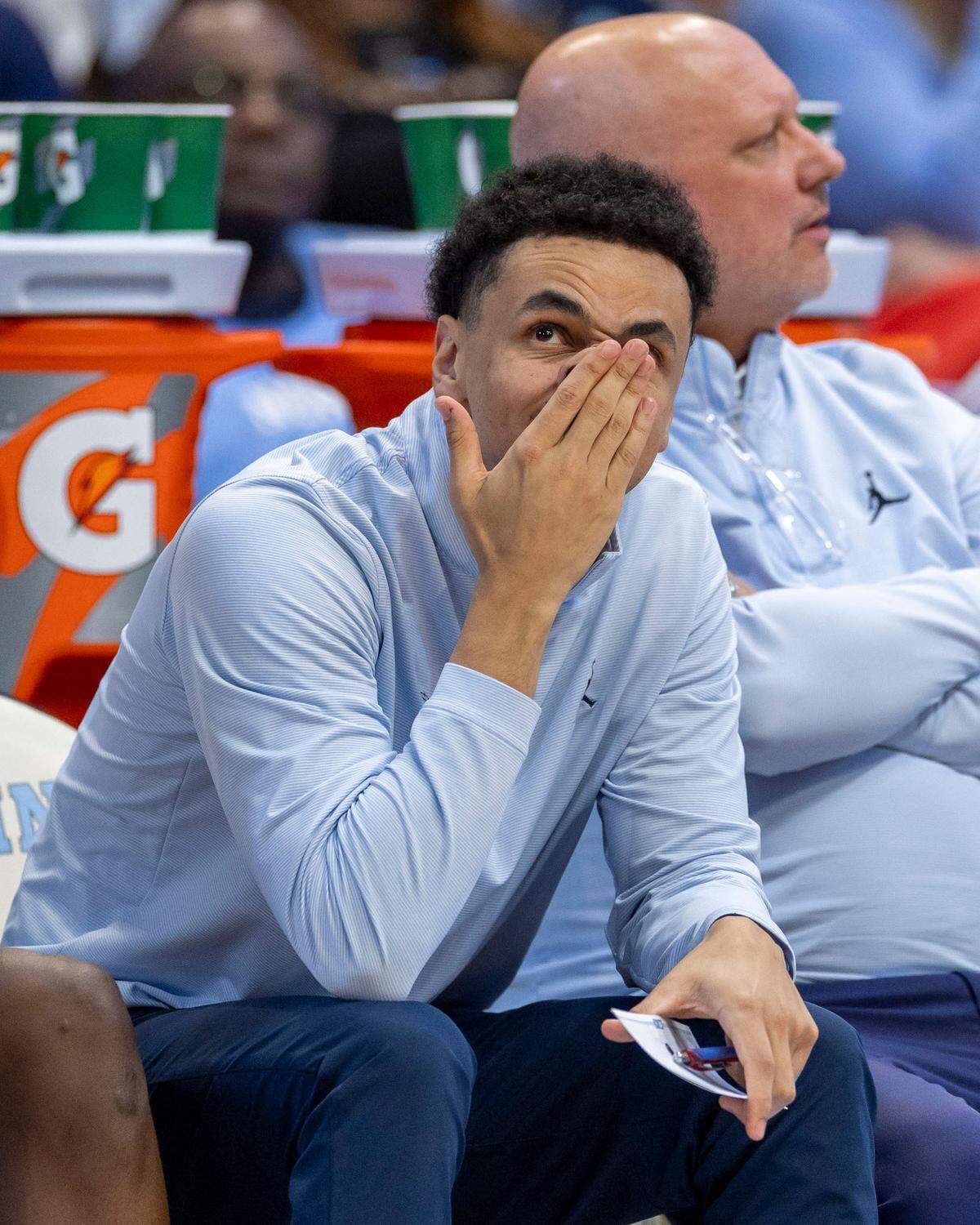 North Carolina assistant coach Marcus Paige reacts after a missed free throw by Elliot Cadeau in the second half against Pitt on Saturday, February 8, 2025 at the Smith Center in Chapel Hill, N.C. The Tar Heels were 8-15 from the free throw line in their victory over Pitt.