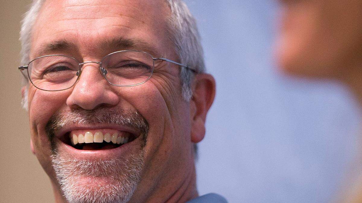 North Carolina men’s lacrosse coach Joe Breschi smiles as he listens to North Carolina women’s lacrosse coach Jenny Levy during a press conference together where both coaches talked about winning dual NCAA National Championships on Tuesday, May 31, 2016 at Kenan Stadium in Chapel Hill, N.C.