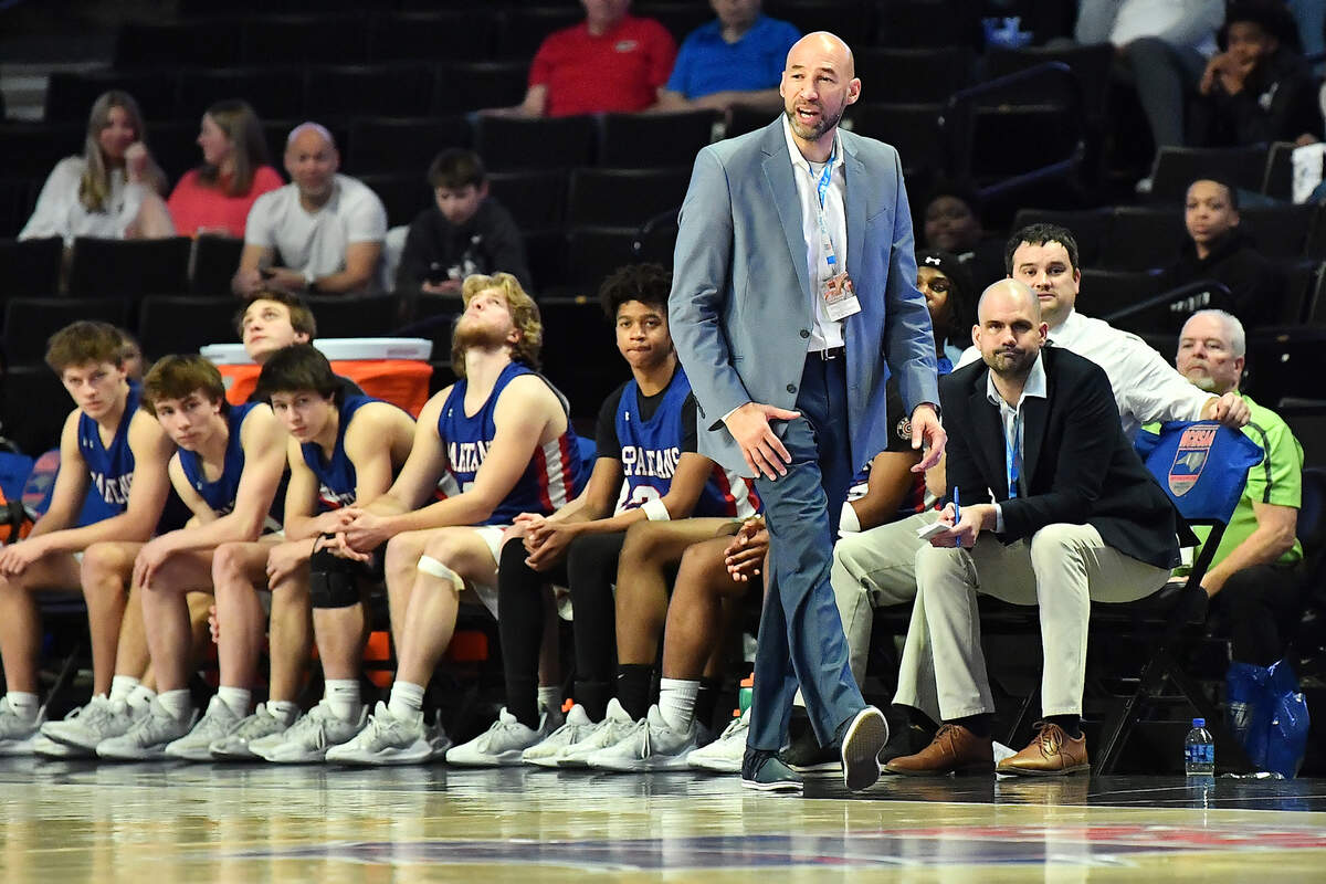 Sanderson head coach Roy Roberson reacts to action on the court against New Hanover during the first half. The Sanderson Spartans and the New Hanover Wildcats met in the NCHSAA 4A East Regional Final in Winston-Salem, N.C. on March 12, 2025.