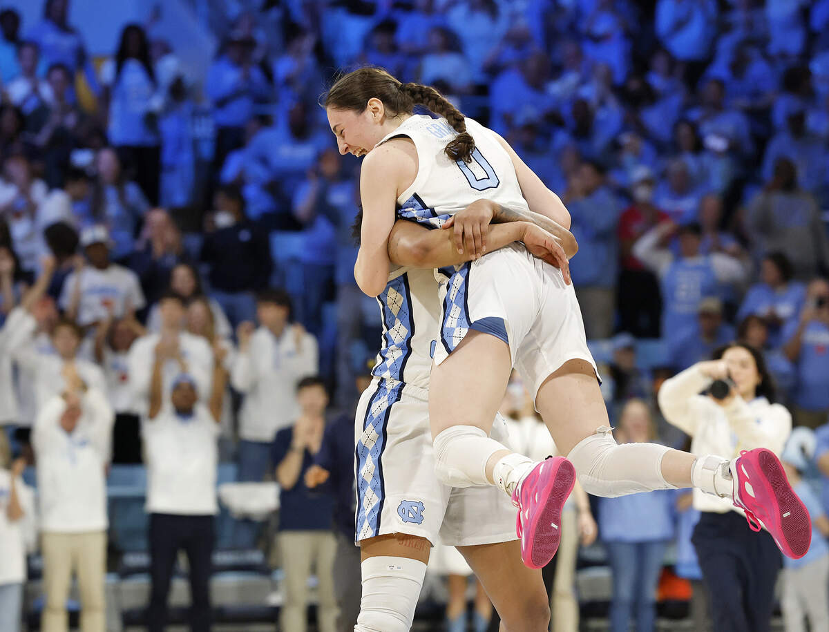 North Carolina’s Nyla Harris and Lanie Grant celebrate following the Tar Heels’ 74-69 win over Duke on Sunday, March 1, 2026, at Carmichael Arena in Chapel Hill, N.C.