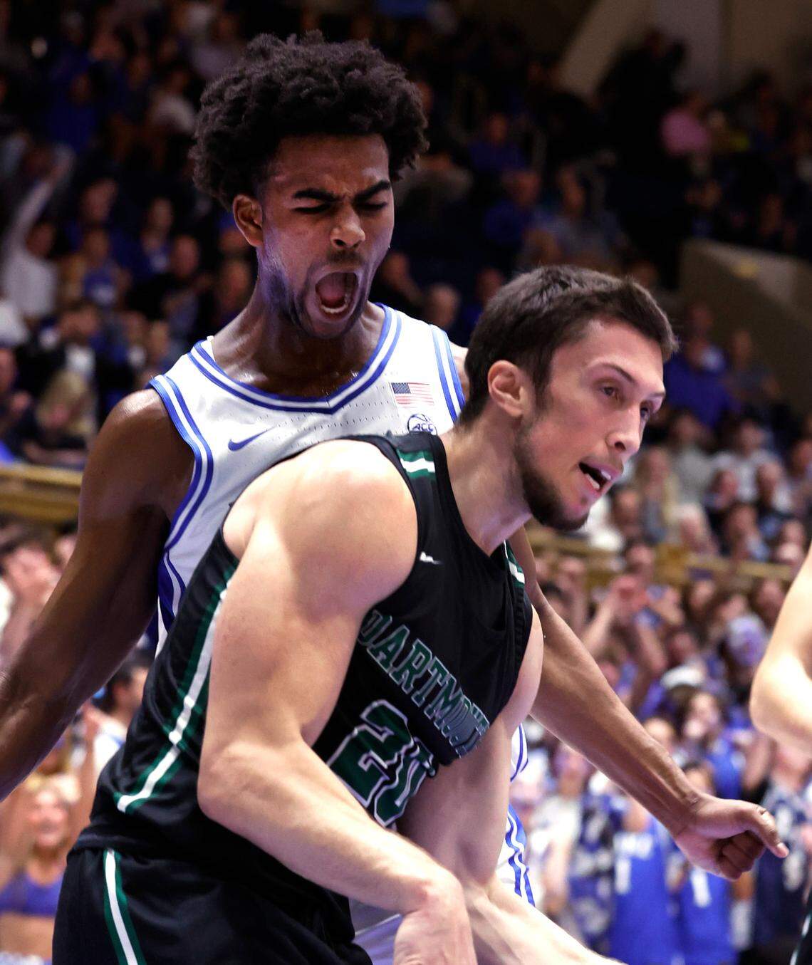Duke’s Sean Stewart (13) reacts after slamming in two over Dartmouth’s Romeo Myrthil (20) during the second half of Duke’s 92-54 victory over Dartmouth at Cameron Indoor Stadium in Durham, N.C., Monday, Nov. 6, 2023.